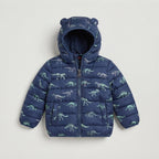Chaqueta acolchada EmpiBy azul marino con estampado de esqueletos de dinosaurios y capucha con orejas para niños