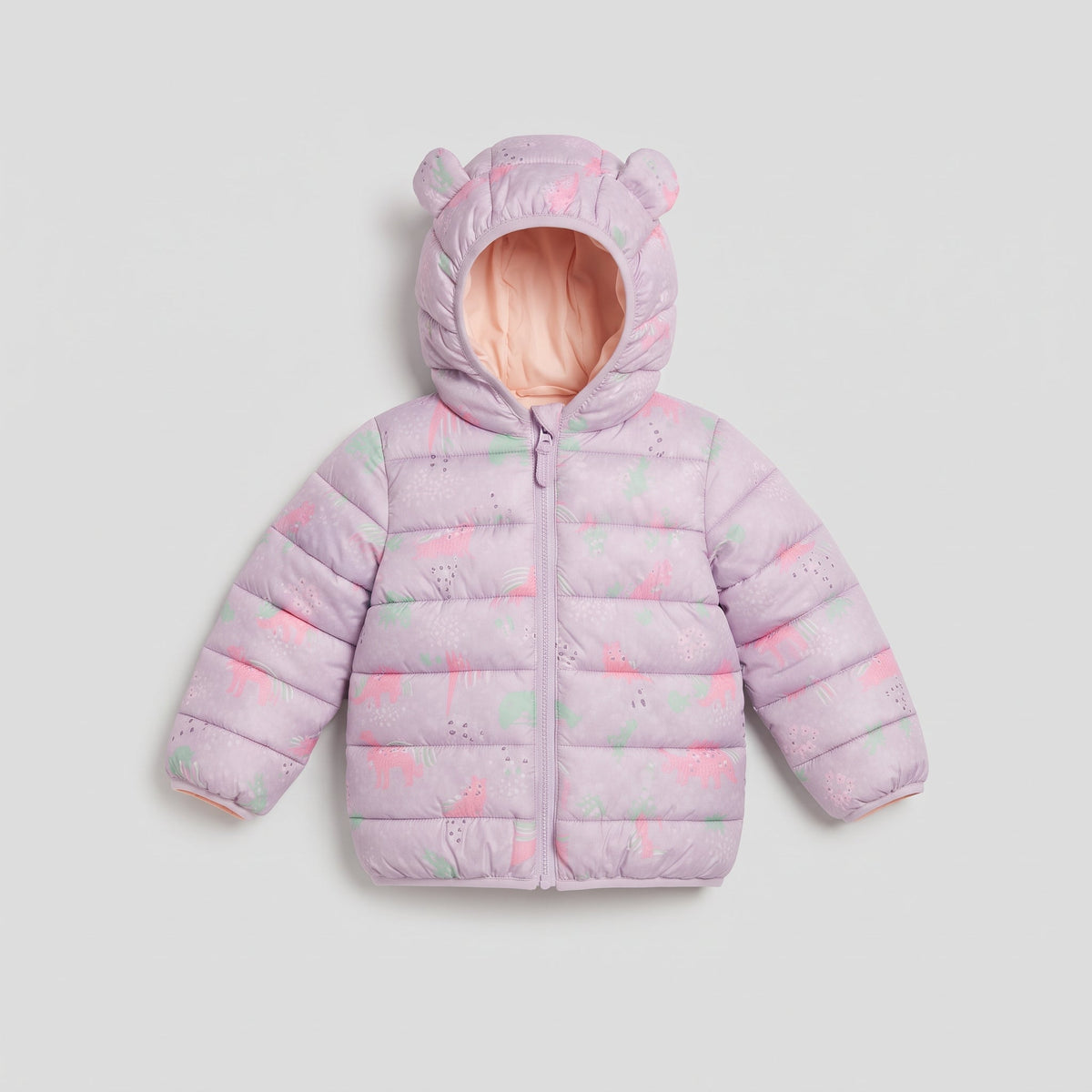 Chaqueta acolchada EmpiBy color lila con estampado de unicornios, capucha con orejitas y cierre frontal.
