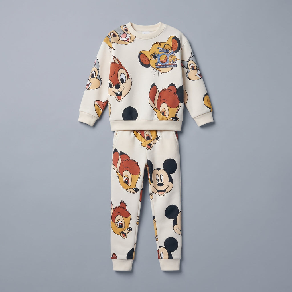 Conjunto EmpiBy de dos piezas para niño con estampado de Bambi y amigos en sudadera beige y pantalón jogger a juego