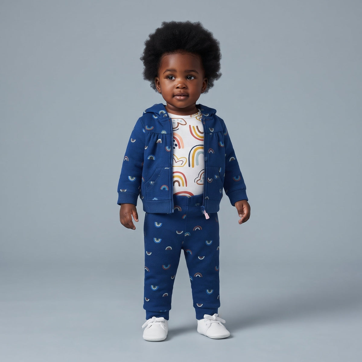 Conjunto EmpiBy de 3 piezas para bebé niña con estampado de arcoíris, chaqueta azul con capucha, body y pantalón.