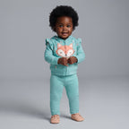 Bebé con conjunto EmpiBy de 3 piezas: chaqueta azul menta con capucha y zorrito, body rosa y pantalón floral a juego.