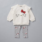 Conjunto EmpiBy de dos piezas para niña con sudadera marfil de Hello Kitty y leggings grises estampados