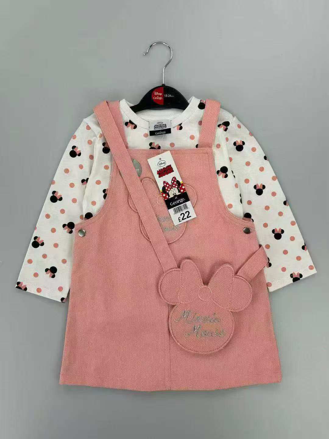 Conjunto EmpiBy George Disney de vestido jardinera rosa de pana y camiseta blanca con estampado de Minnie Mouse