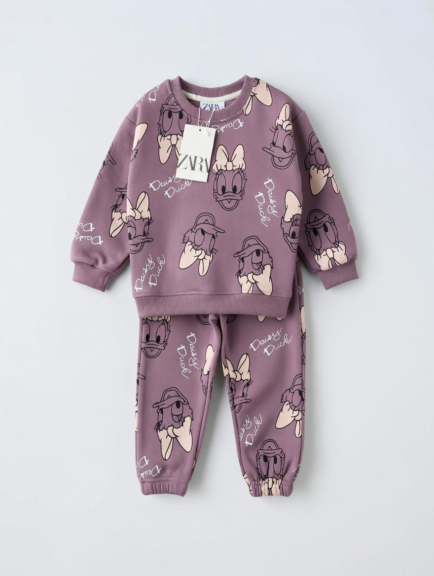 Conjunto EmpiBy de sudadera y pantalón malva con estampado de Daisy Duck para niña
