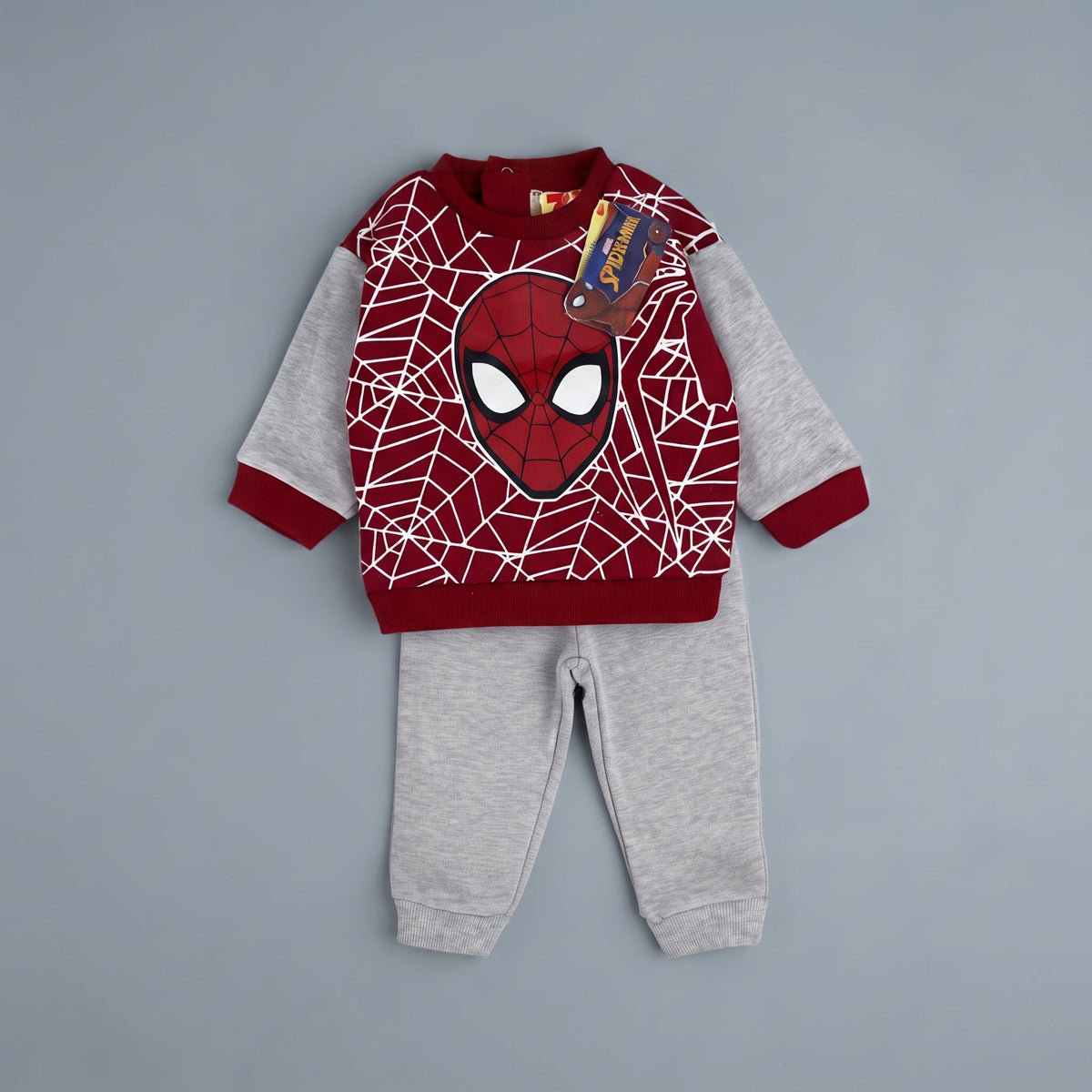 Conjunto EmpiBy de dos piezas para bebé con sudadera roja de Spiderman y pantalón jogger gris jaspeado
