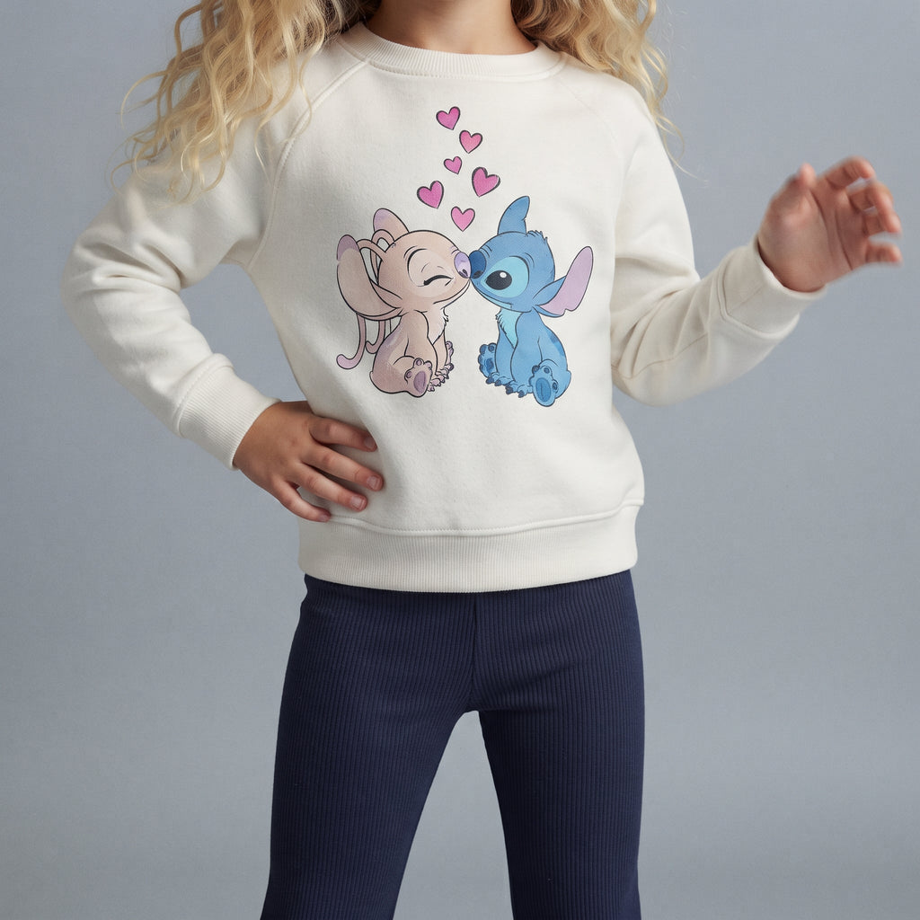Conjunto EmpiBy de dos piezas para niña con sudadera color hueso de Stitch y Angel y pantalón azul marino