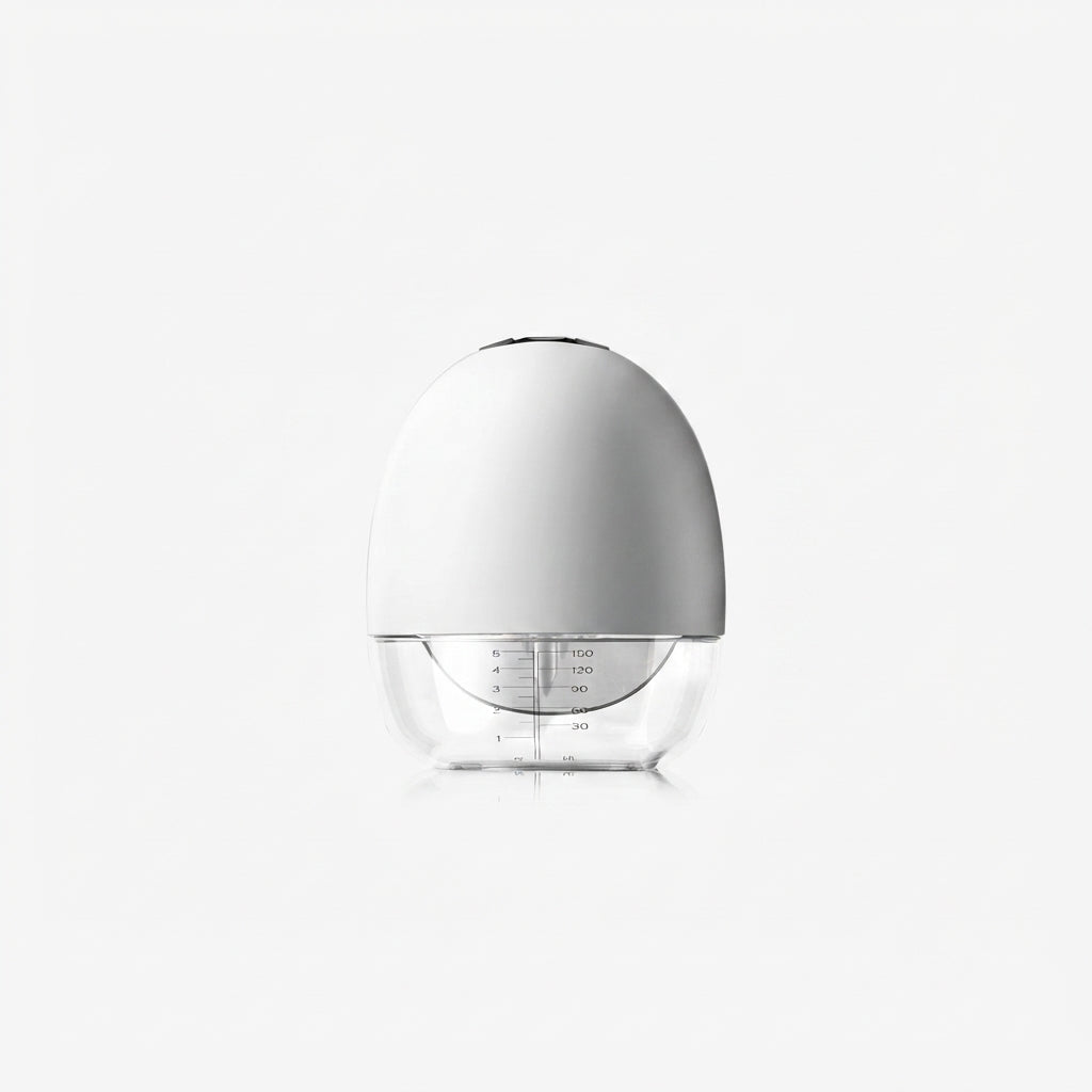 Extractor de leche eléctrico manos libres EmpiBy S18 con diseño compacto, color blanco y depósito transparente.