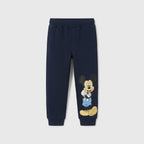 Pantalón de chándal EmpiBy azul marino para niño con estampado de Mickey Mouse en la pernera y cintura elástica.