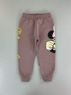 Pantalones de chándal EmpiBy color malva con estampado de Minnie Mouse y detalles en amarillo para niña