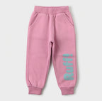 Pantalón de chándal rosa EmpiBy para niña con detalle de texto Ruff en la pierna y cintura elástica cómoda