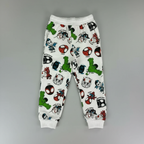 Pantalón jogger infantil EmpiBy blanco con estampado de personajes de Spidey y sus amigos en colores vibrantes