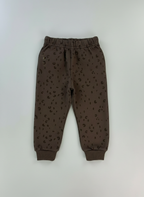 Pantalón jogger EmpiBy color marrón chocolate con estampado sutil de manchas salvajes y puños acanalados