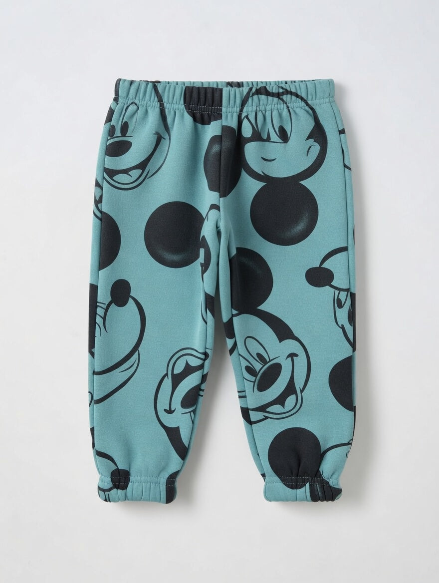 Pantalones jogger EmpiBy para niños en azul aguamarina con estampado integral de Mickey Mouse y puños elásticos