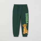 Pantalón jogger EmpiBy verde oscuro de El Rey León con estampado de Simba y texto lateral para niños