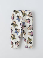Pantalones de chándal EmpiBy para niña en color crema con estampado integral de caras de Minnie Mouse