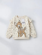 Sudadera EmpiBy de Bambi color crema con estampado de puntos y volantes en los hombros para niña
