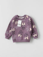 Sudadera EmpiBy de color malva con estampado integral de Daisy Duck para niña, de corte cómodo y estilo casual.