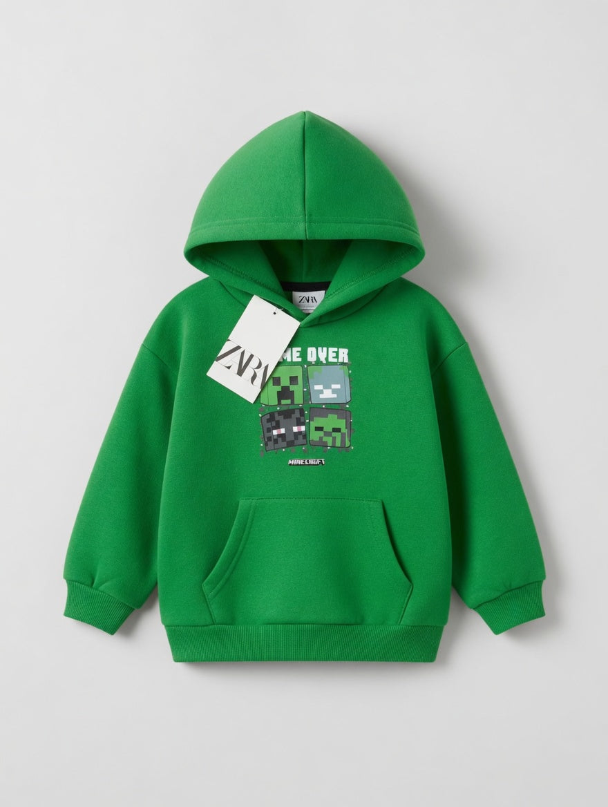 Sudadera EmpiBy verde con capucha, bolsillo canguro y estampado frontal de Minecraft Game Over para niños.