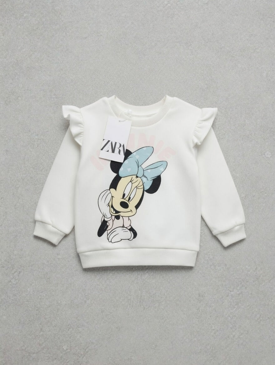 Sudadera EmpiBy color blanco hueso con estampado de Minnie Mouse, lazo azul menta y detalles de volantes en hombros