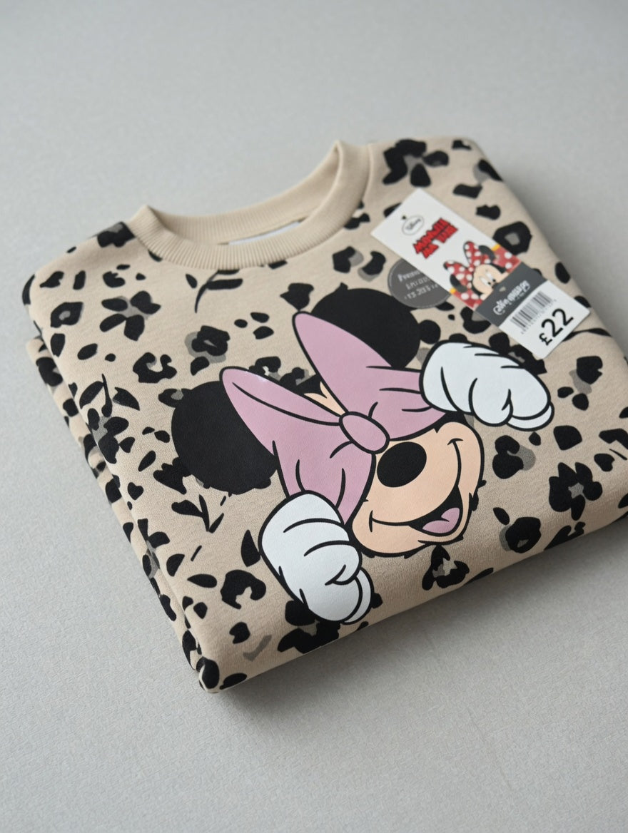 Sudadera EmpiBy de Minnie Mouse con estampado animal print en tonos beige y negro para niña