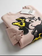 Sudadera EmpiBy de Minnie Mouse en color rosa suave con estampado gráfico y puños elásticos