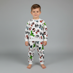 Niño vistiendo conjunto EmpiBy de sudadera y pantalón blanco con estampado de personajes de Spidey and Friends