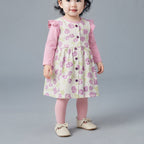 Conjunto EmpiBy de 3 piezas para bebé niña con vestido floral marfil, camiseta rosa de manga larga y medias a juego.