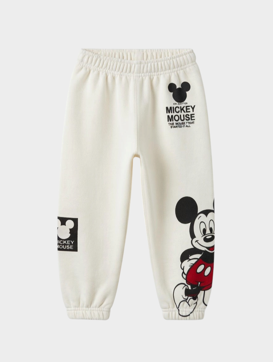 Pantalón jogger EmpiBy color crema de algodón perchado con estampado de Mickey Mouse y cintura elástica
